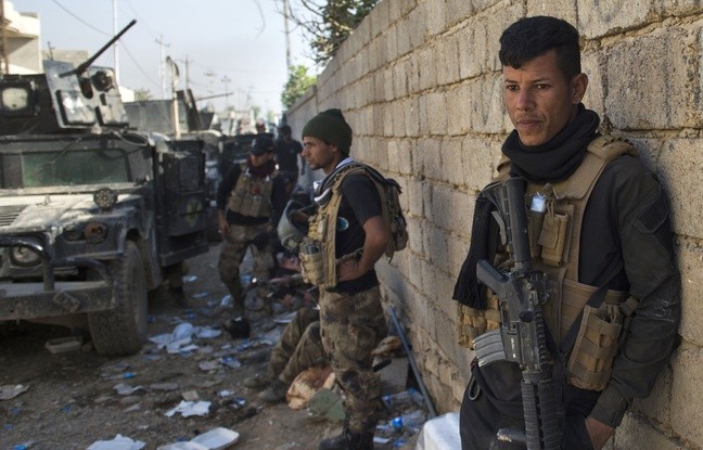 Les forces d'élite irakiennes progressent dans les rues de Mossoul - ảnh 1